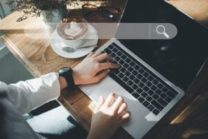 laptop and coffee on a desk