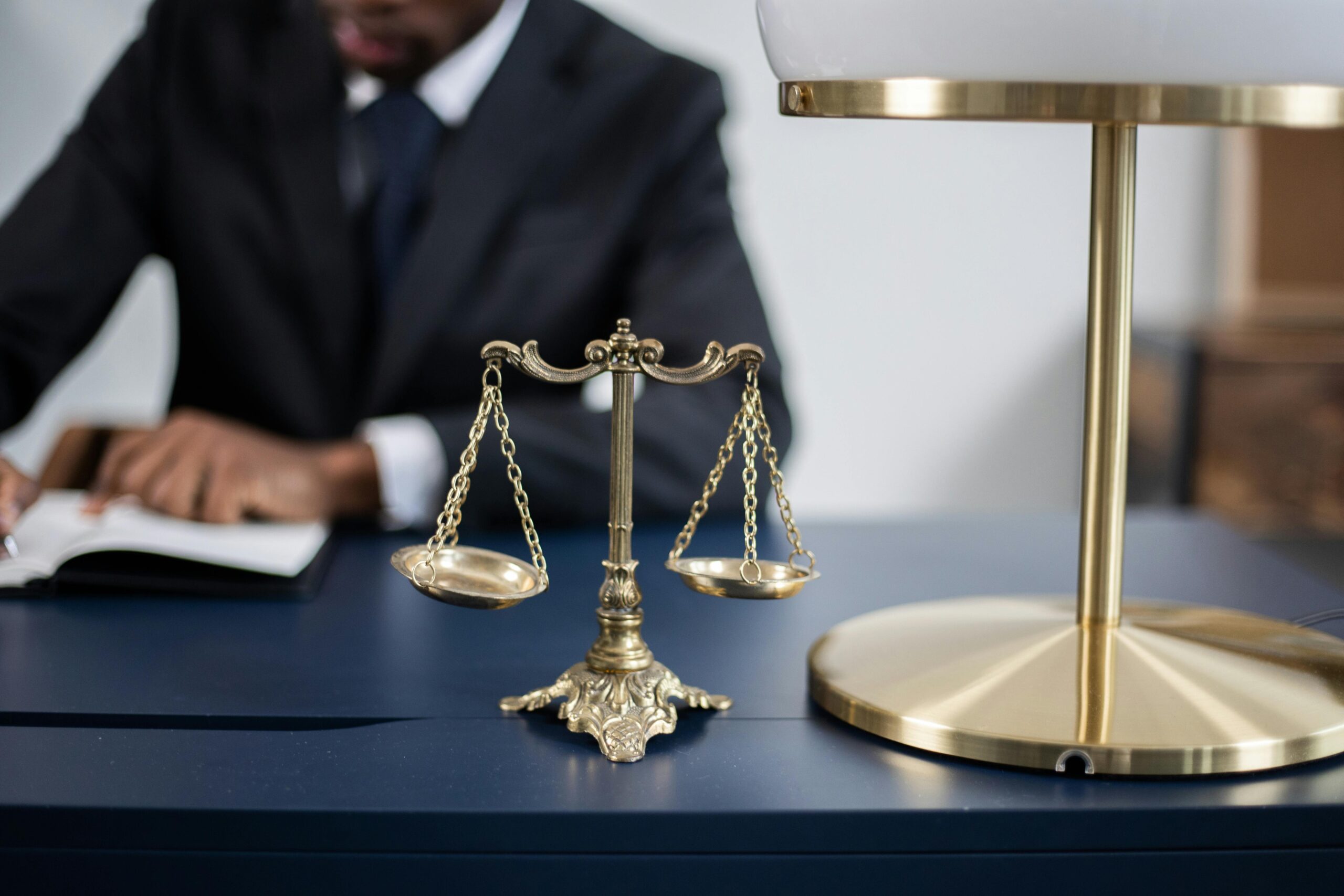 Photo by KATRIN BOLOVTSOVA: https://www.pexels.com/photo/a-balance-scale-on-a-table-6077861/