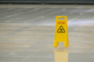 https://www.istockphoto.com/photo/a-yellow-caution-sign-is-on-the-floor-gm2158128825-578779809