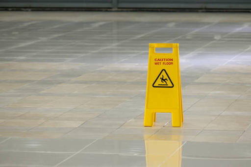 https://www.istockphoto.com/photo/a-yellow-caution-sign-is-on-the-floor-gm2158128825-578779809