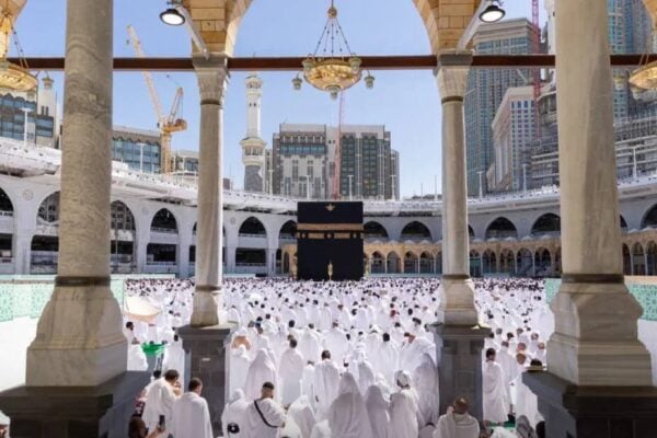Pilgrims gathered around the Holy Kaaba at Masjid al-Haram in Makkah during Umrah.