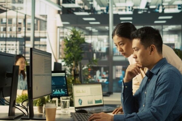 two people at the office working