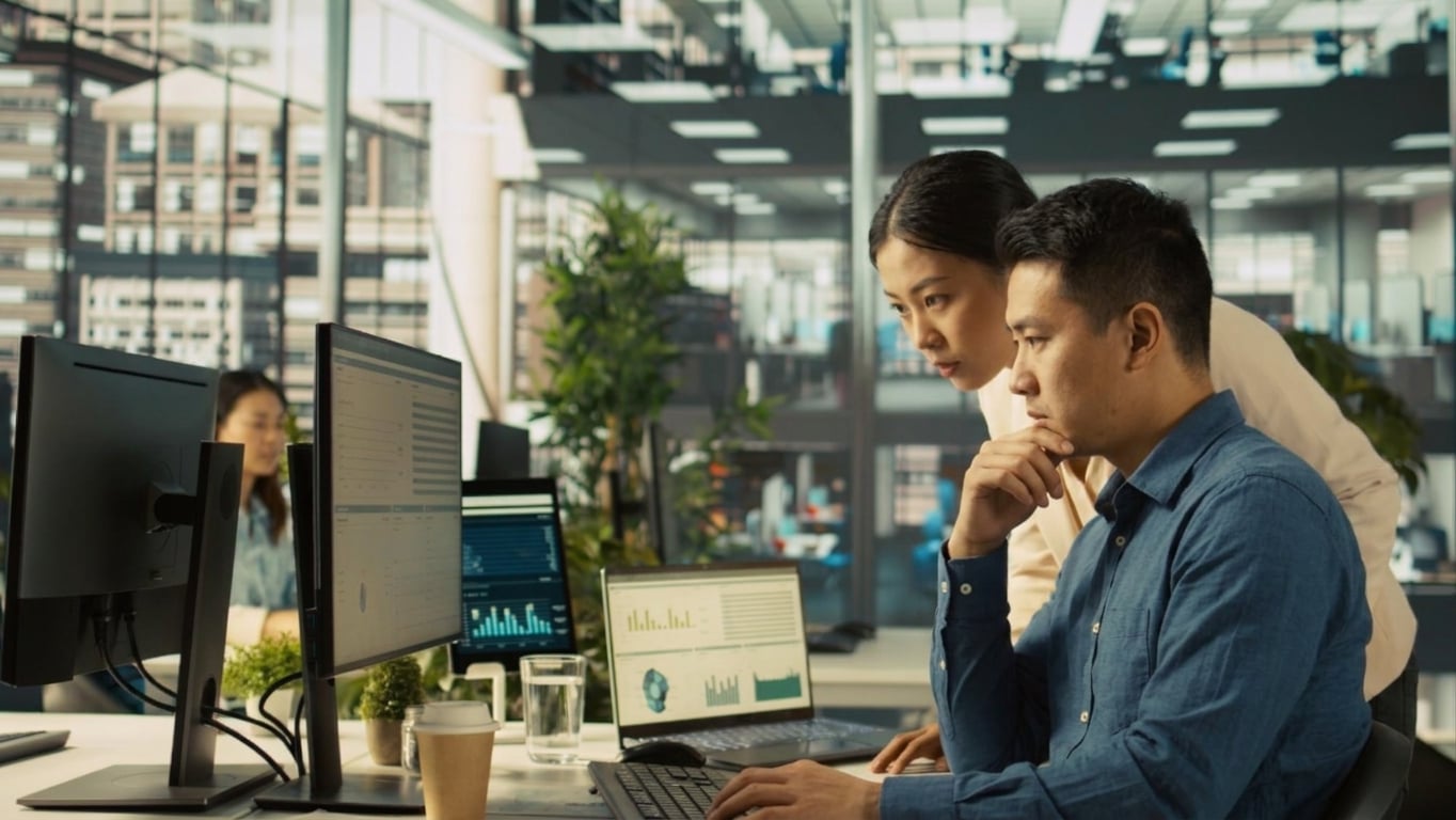 two people at the office working
