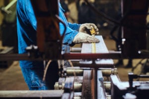 man working with metal