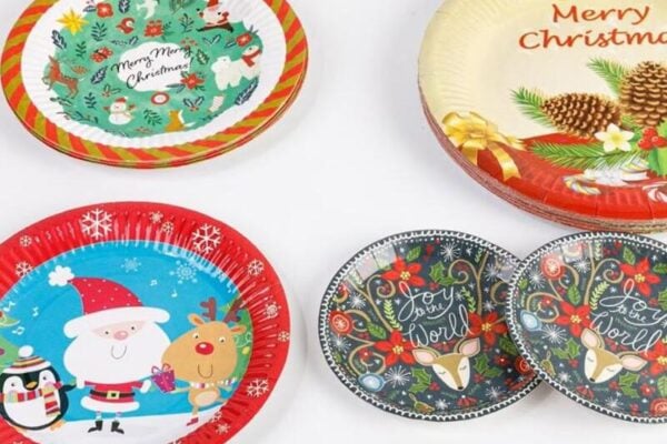 Colorful custom Christmas paper plates featuring Santa Claus, reindeer, festive ornaments, and holiday designs by Print On Papers.